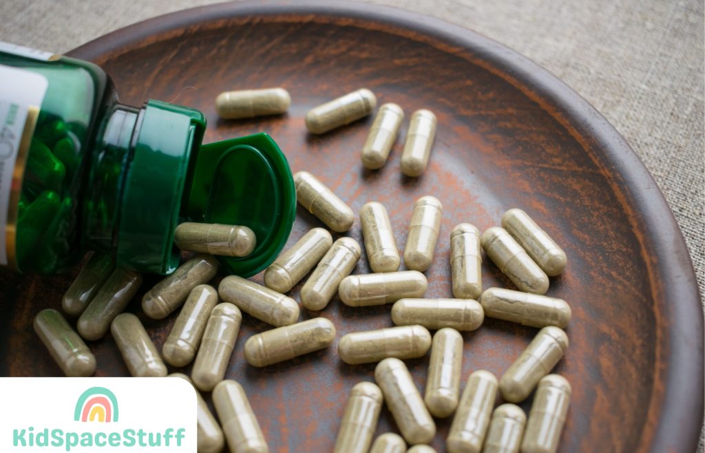 Close up Biotin Capsules and Bottle on Brown Plate