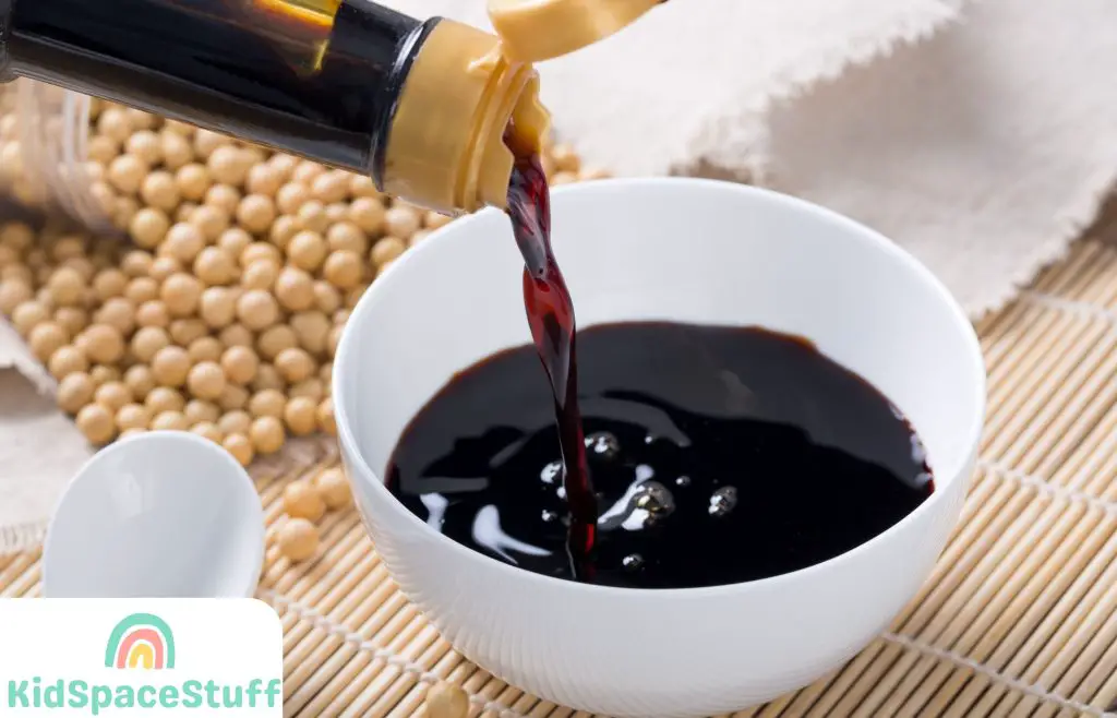 Pouring soy sauce into a white bowl