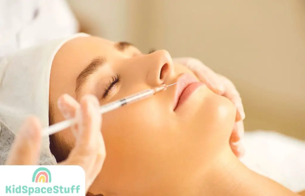 Woman Getting Lip Injections from a Cosmetic Surgeon